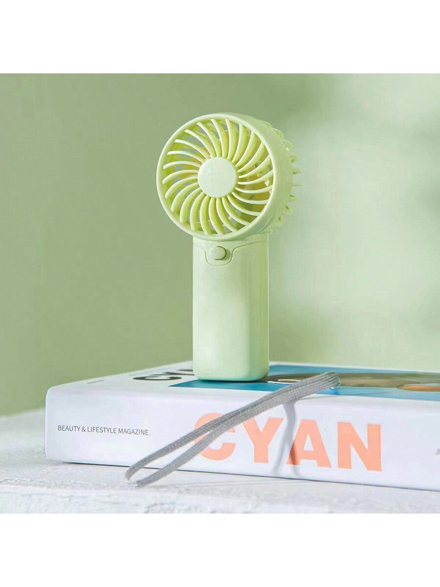 1 pièce Mini ventilateur à 1 vitesse de vent avec corde de suspension - cadeau de fête (piles non incluses, à acheter séparément) pour l'été et pour extérieur, sport, voyage, cuisine, chambre, école, bureau, et pour femme, homme, enfant, adulte