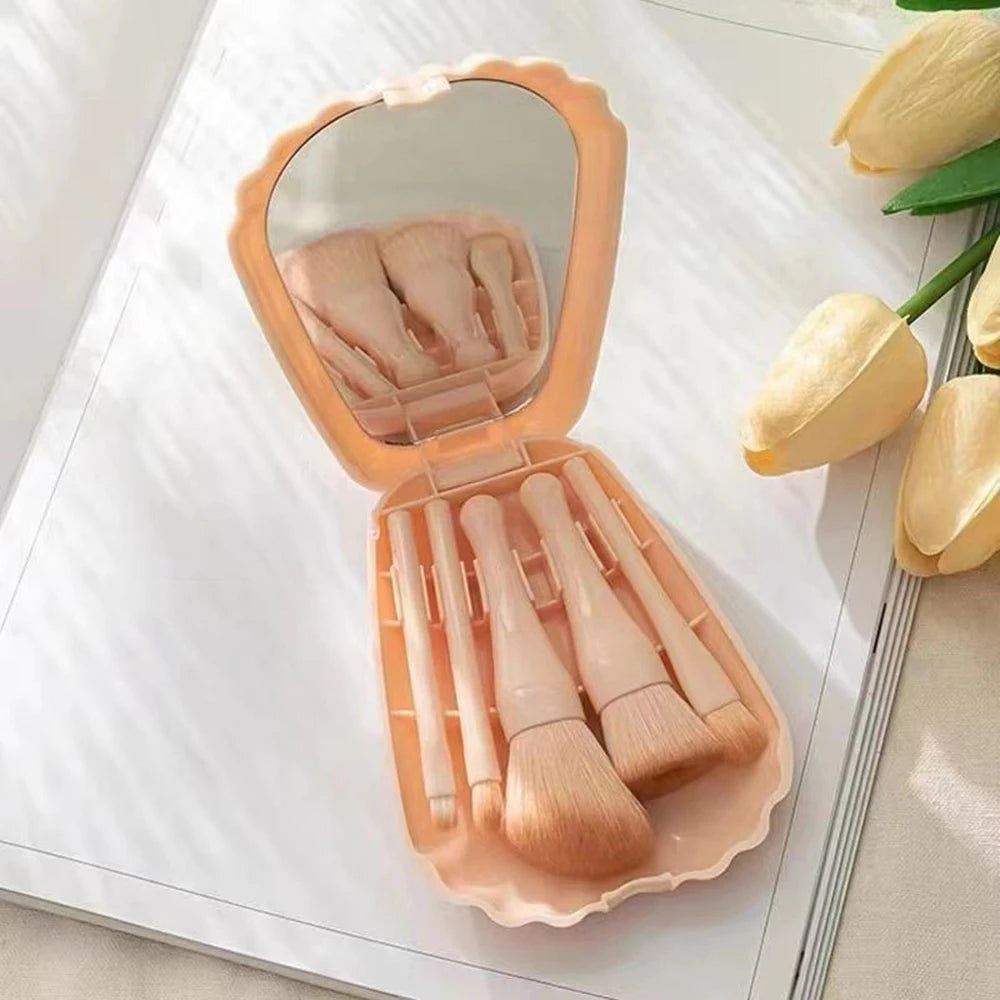 Ensemble de pinceaux de maquillage portable : 5 pinceaux essentiels, incluant pinceau fond de teint et ombre à paupières. Livré avec miroir pratique, idéal pour les voyages.