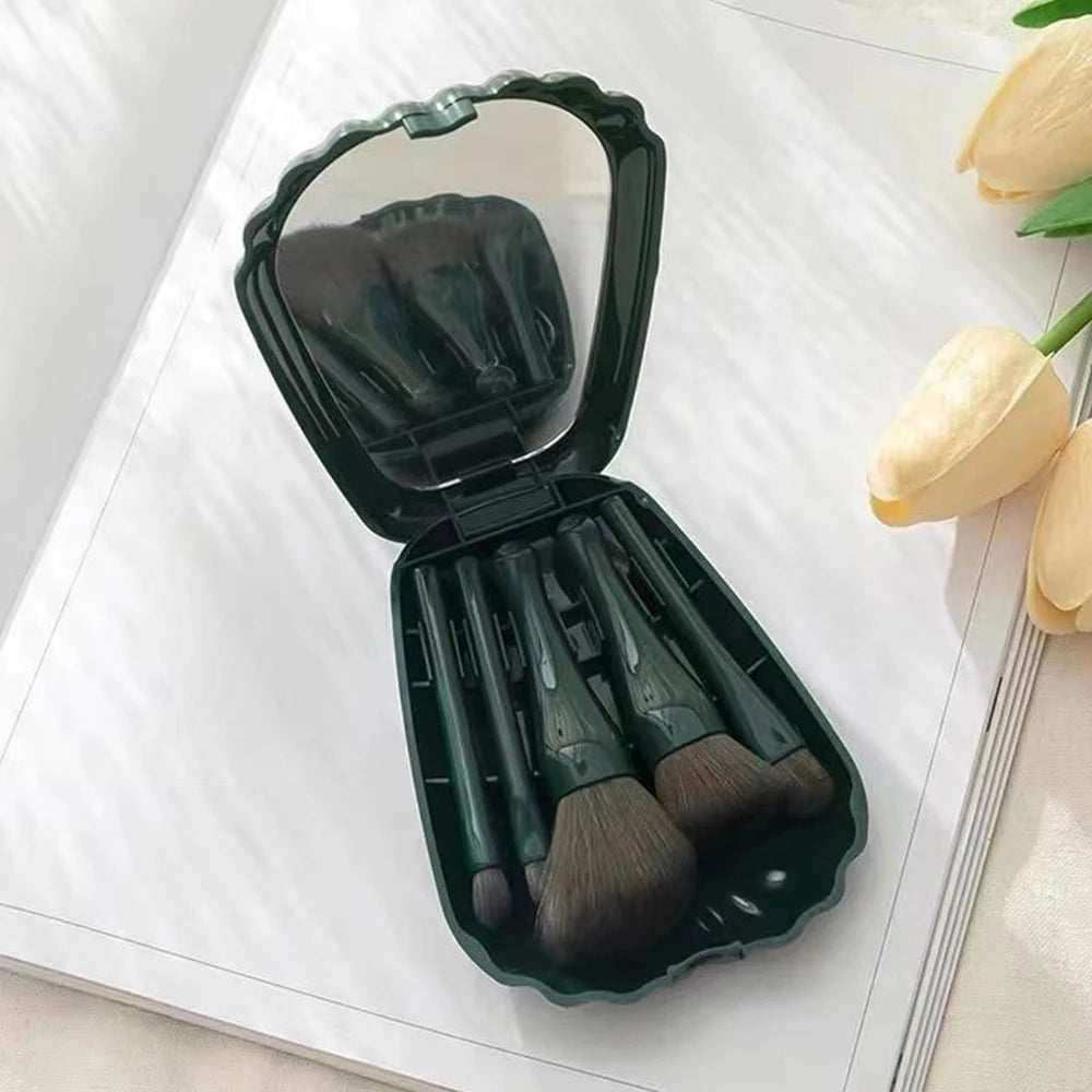 Ensemble de pinceaux de maquillage portable : 5 pinceaux essentiels, incluant pinceau fond de teint et ombre à paupières. Livré avec miroir pratique, idéal pour les voyages.